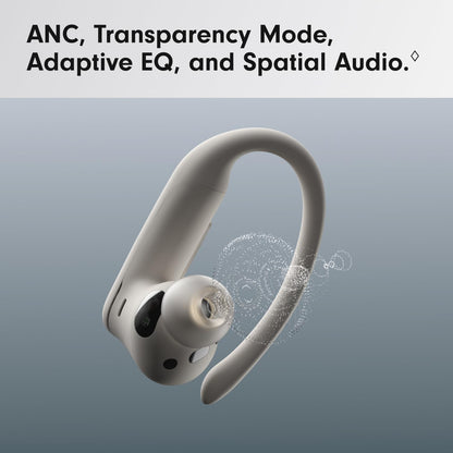 White wireless earbuds with text about audio features on a gray background