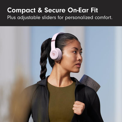 Woman wearing pink headphones with text about compact and secure on-ear fit and adjustable sliders for comfort.