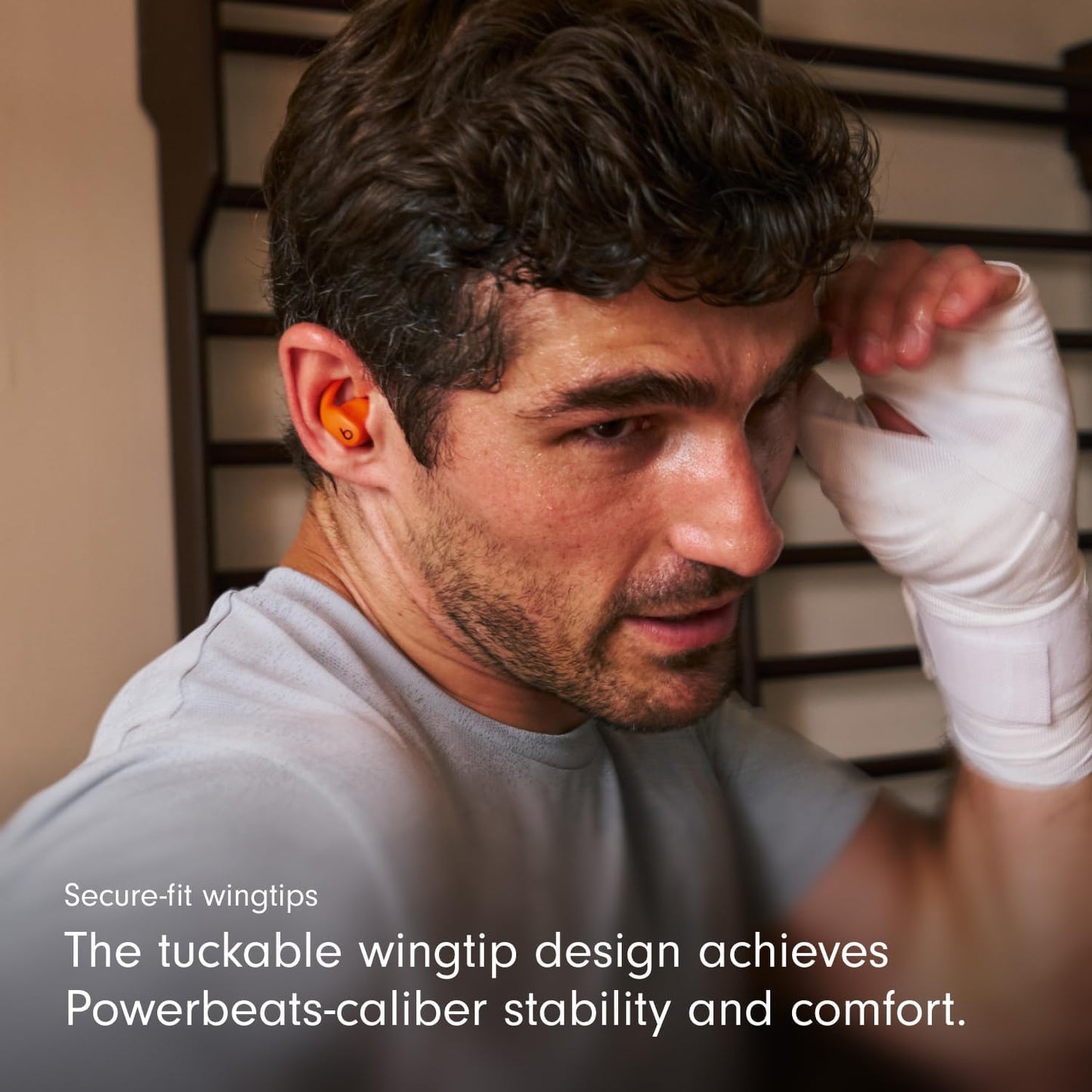 Beats Powerbeats Fit – Wireless Noise-Cancelling Workout Earbuds with Secure Fit Wingtips – Spark Orange