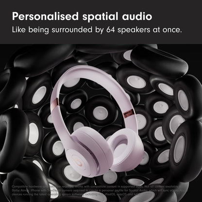 Headphones surrounded by circular speakers with text about personalized spatial audio.