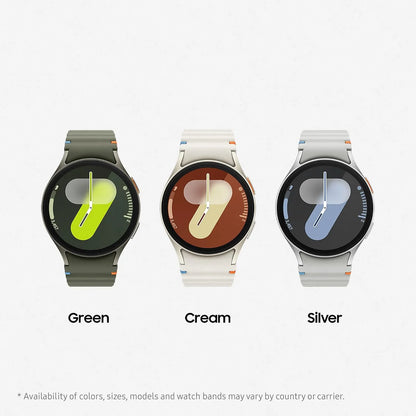 Three smartwatches in green, cream, and silver on a white background